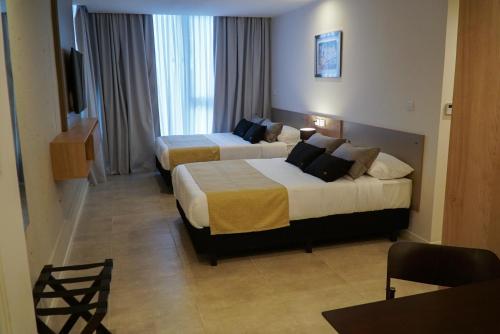 Imagen de la habitación del Hotel Amerian Rio Cuarto. Foto 13