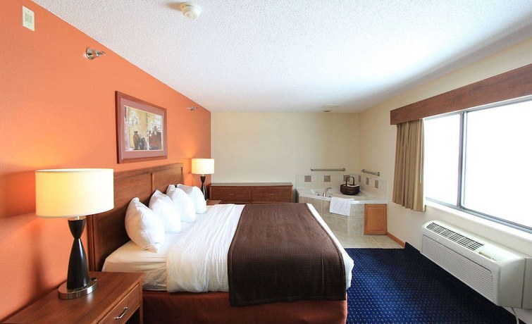 Imagen de la habitación del Hotel AmericInn by Wyndham Cedar Rapids Airport. Foto 14