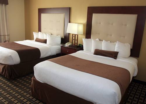 Imagen de la habitación del Hotel AmericInn by Wyndham Woodstock IL. Foto 11