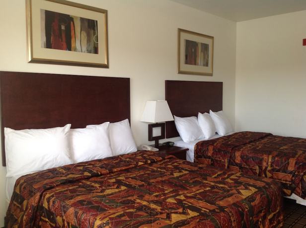 Imagen de la habitación del Hotel America Inn and Suites. Foto 17