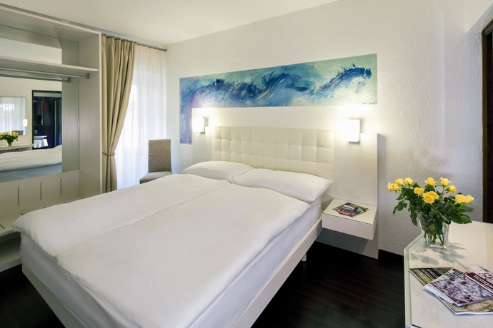 Imagen de la habitación del Hotel America, Locarno. Foto 10