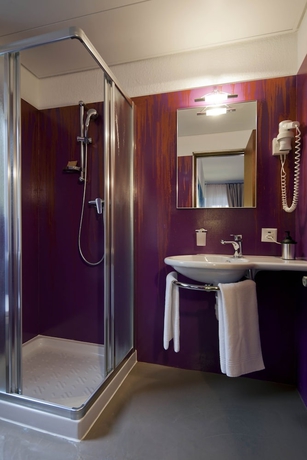 Imagen de la habitación del Hotel America, Locarno. Foto 15