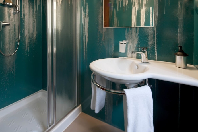 Imagen de la habitación del Hotel America, Locarno. Foto 18