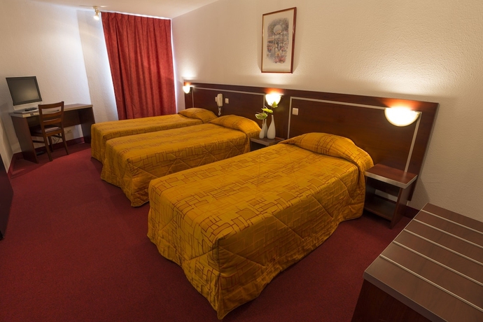 Imagen de la habitación del Hotel America Lourdes. Foto 6