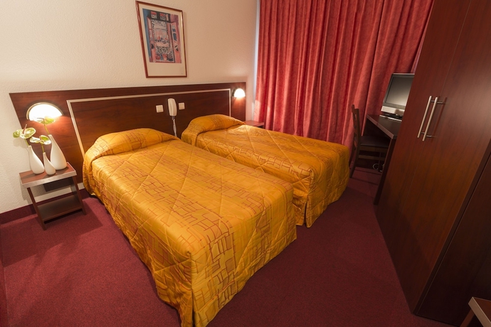 Imagen de la habitación del Hotel America Lourdes. Foto 7