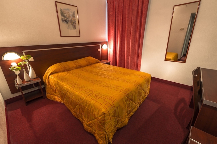 Imagen de la habitación del Hotel America Lourdes. Foto 8