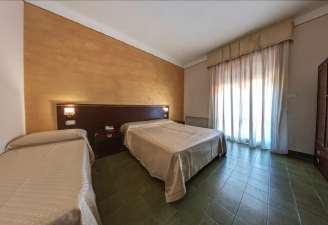 Imagen de la habitación del Hotel America, Marina di Camerota. Foto 11