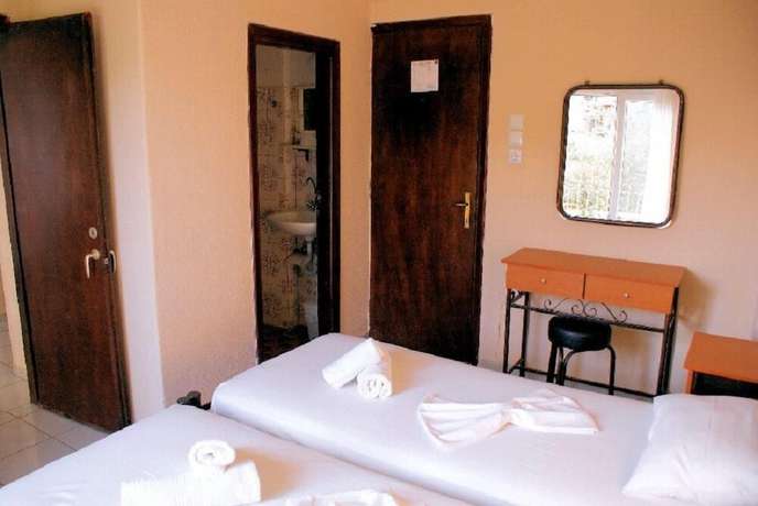 Imagen de la habitación del Hotel America, Tasos. Foto 9