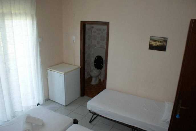 Imagen de la habitación del Hotel America, Tasos. Foto 13