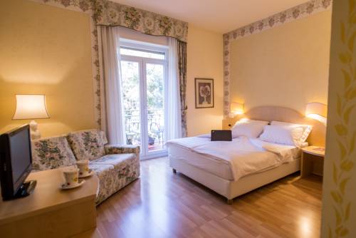 Imagen de la habitación del Hotel America, Trento. Foto 7