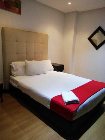 Imagen de la habitación del Hotel American Deluxe BC. Foto 3