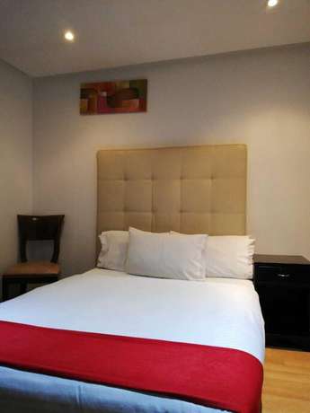 Imagen de la habitación del Hotel American Deluxe BC. Foto 8