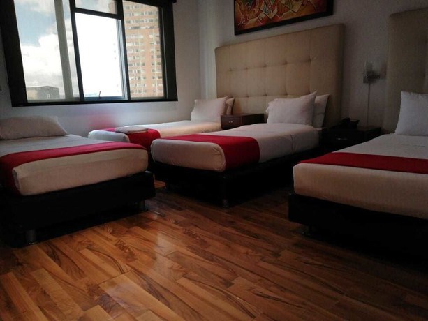 Imagen de la habitación del Hotel American Deluxe BC. Foto 13