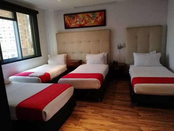 Imagen de la habitación del Hotel American Deluxe BC. Foto 17