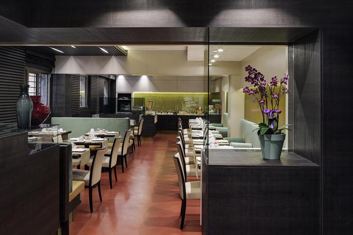 Imagen del bar/restaurante del Hotel American Dinesen. Foto 2