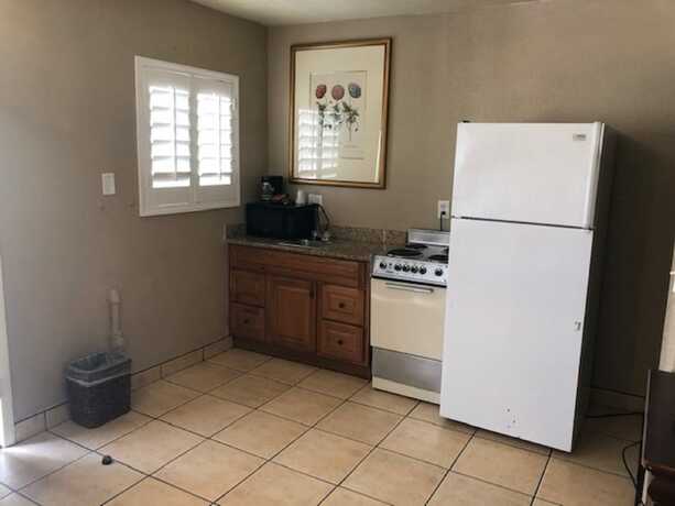 Imagen de la habitación del Hotel American Executive Inn. Foto 15