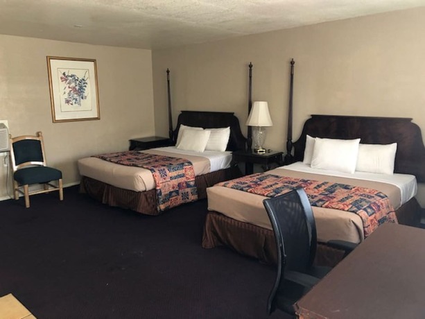 Imagen de la habitación del Hotel American Executive Inn. Foto 17