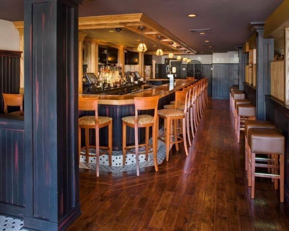 Imagen del bar/restaurante del Hotel American, Freehold. Foto 2