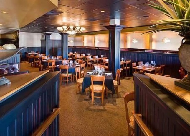 Imagen del bar/restaurante del Hotel American, Freehold. Foto 4