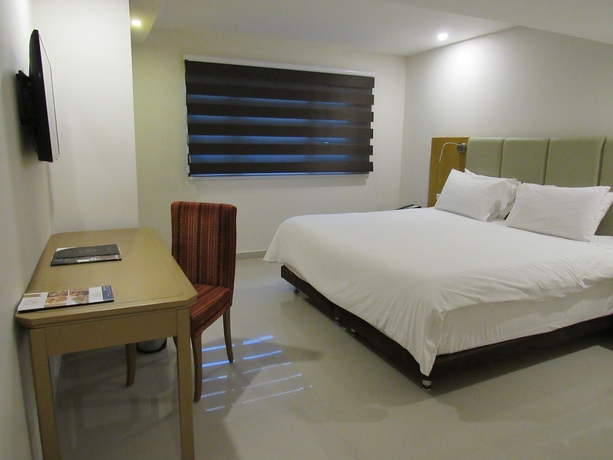 Imagen de la habitación del Hotel American Golf. Foto 8