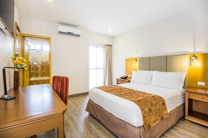 Imagen de la habitación del Hotel American Golf. Foto 11