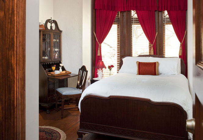 Imagen de la habitación del Hotel American Guest House. Foto 11