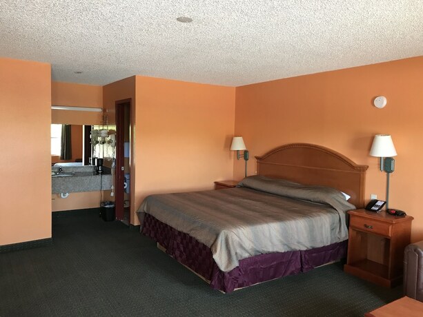 Imagen de la habitación del Hotel American Inn Cleburne. Foto 16