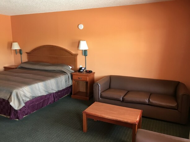 Imagen de la habitación del Hotel American Inn Cleburne. Foto 19