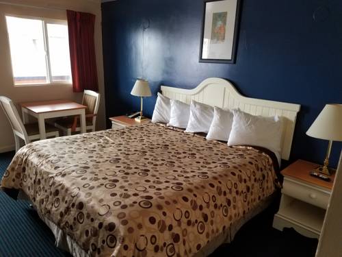 Imagen de la habitación del Hotel American Inn Grover Beach. Foto 4