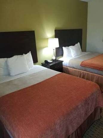 Imagen de la habitación del Hotel American Inn Madill. Foto 6