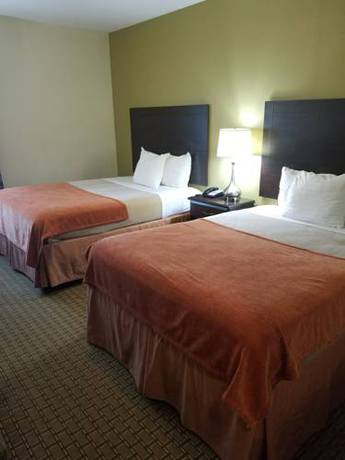 Imagen de la habitación del Hotel American Inn Madill. Foto 7