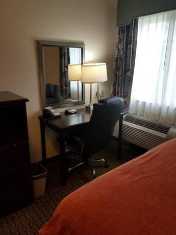 Imagen de la habitación del Hotel American Inn Madill. Foto 9