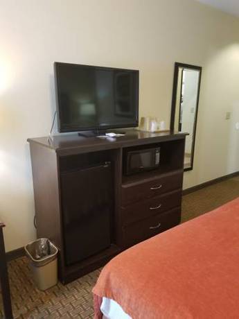 Imagen de la habitación del Hotel American Inn Madill. Foto 11