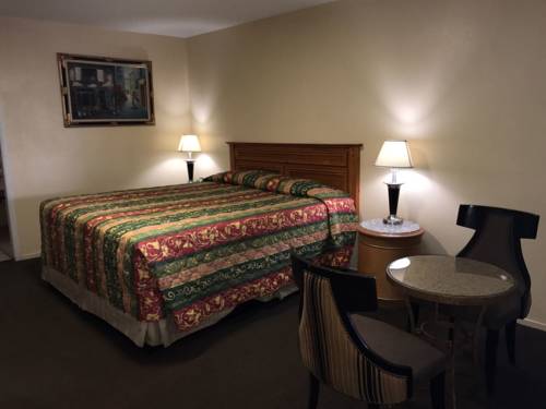 Imagen de la habitación del Hotel American Inn Motel. Foto 3