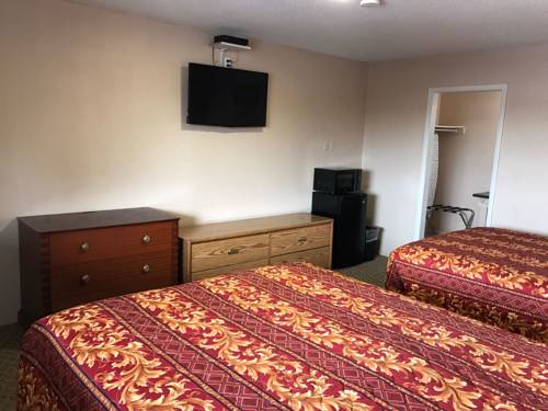 Imagen de la habitación del Hotel American Inn Motel. Foto 12