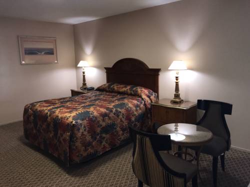 Imagen de la habitación del Hotel American Inn Motel. Foto 15