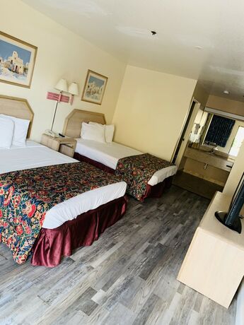 Imagen de la habitación del Hotel American Inn, Phoenix. Foto 13