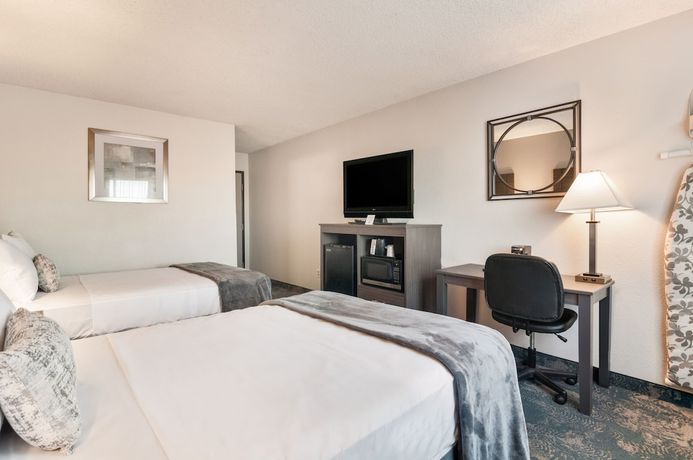 Imagen de la habitación del Hotel American Inn Suites Detroit Metro Airport. Foto 15