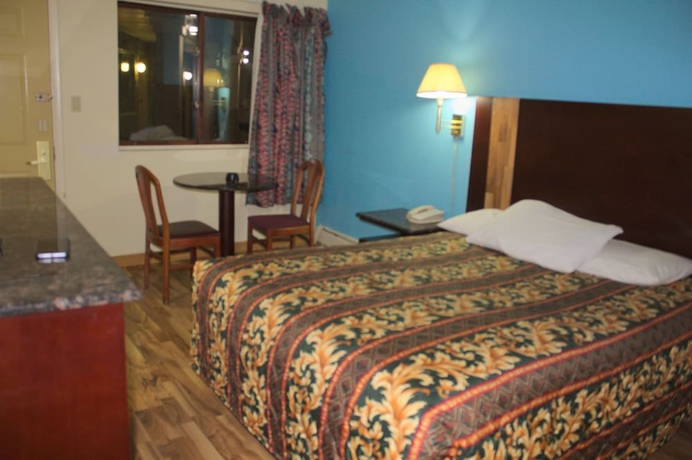 Imagen de la habitación del Hotel American Inn and Suites, Countryside. Foto 9
