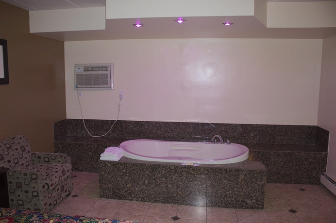 Imagen de la habitación del Hotel American Inn and Suites, Countryside. Foto 10