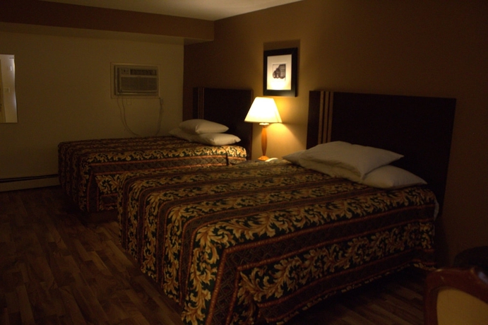 Imagen de la habitación del Hotel American Inn and Suites, Countryside. Foto 12