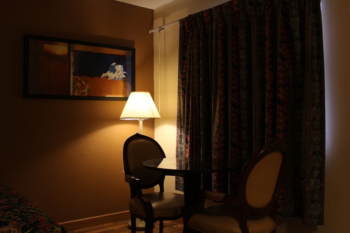 Imagen de la habitación del Hotel American Inn and Suites, Countryside. Foto 13