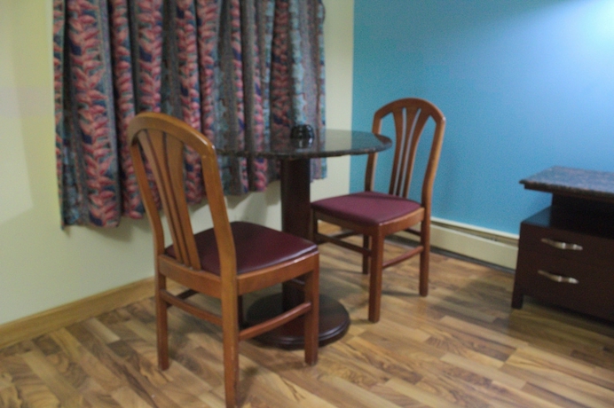 Imagen de la habitación del Hotel American Inn and Suites, Countryside. Foto 14
