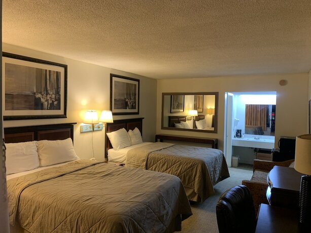 Imagen de la habitación del Hotel American Inn and Suites. Foto 19