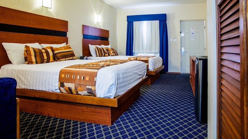 Imagen de la habitación del Hotel American Inn and Suites Hidalgo Del Parral. Foto 12