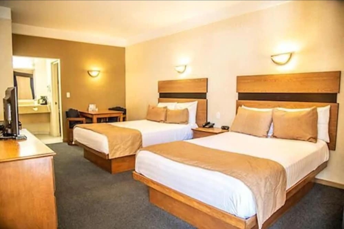 Imagen de la habitación del Hotel American Inn and Suites Hidalgo Del Parral. Foto 14