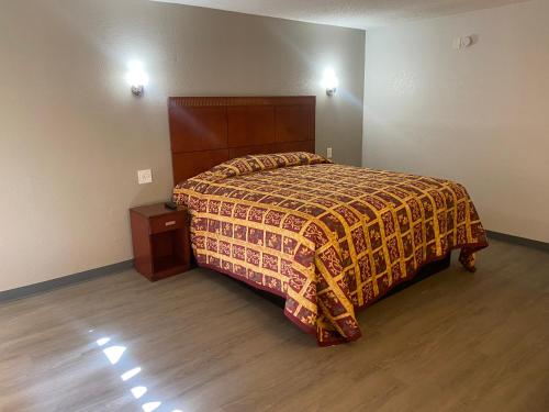 Imagen de la habitación del Hotel American Inn and Suites, Jonesboro. Foto 17