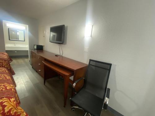Imagen de la habitación del Hotel American Inn and Suites, Jonesboro. Foto 18