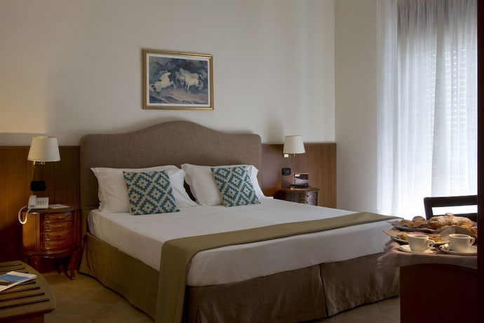 Imagen de la habitación del Hotel American, Pozzuoli. Foto 5