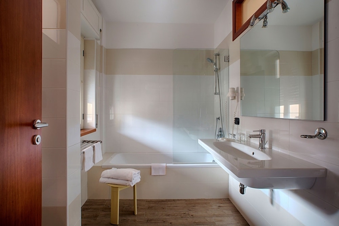 Imagen de la habitación del Hotel American, Pozzuoli. Foto 10